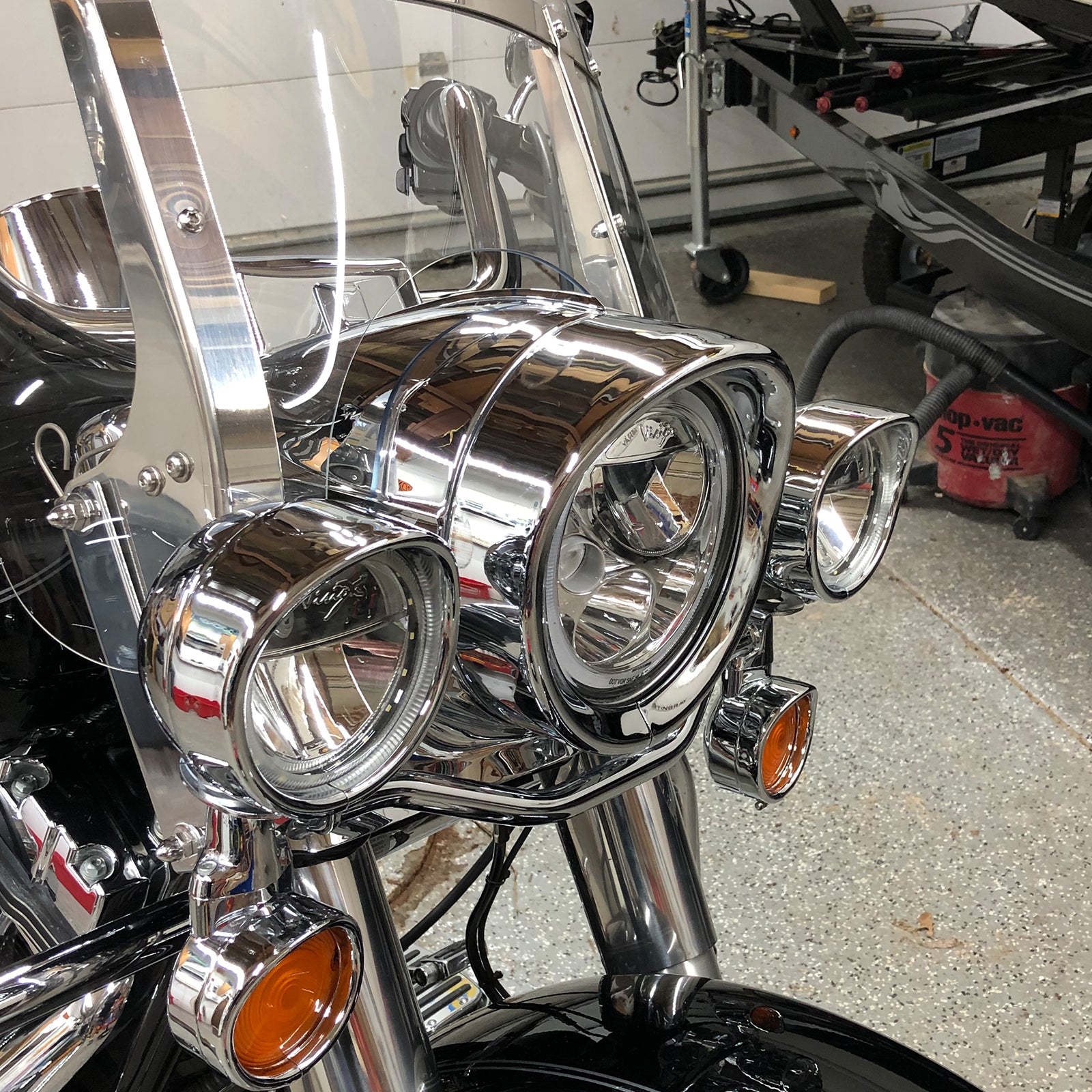 4.5" Auxiliary Passing Light Trim Ring Bezel for Harley-Davidson Touring Models (2PCS) installed on motorcycle.